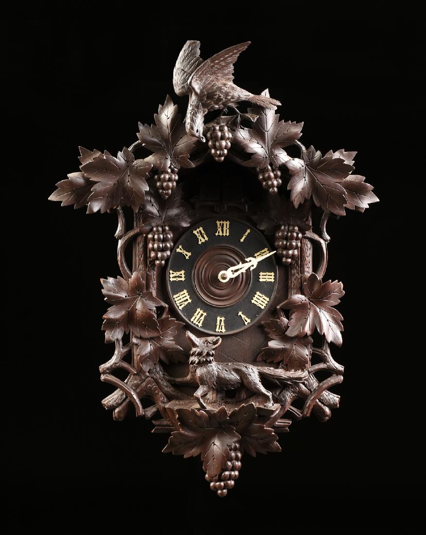 A BLACK FOREST CARVED PINE CUCKOO CLOCK, GERMAN, (1 of 7)