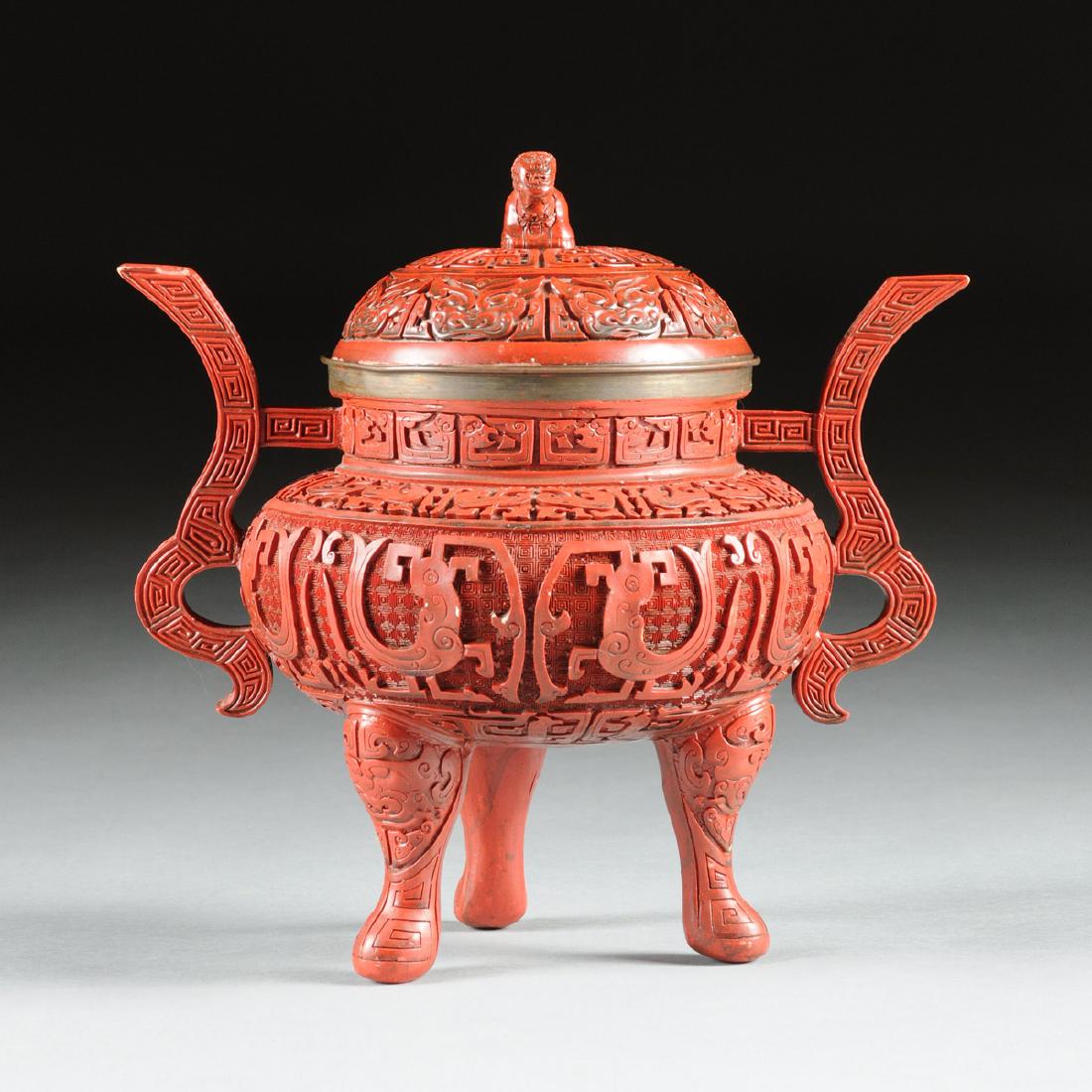 A CHINESE ARCHAISTIC STYLE CARVED CINNABAR LIDDED (1 of 8)