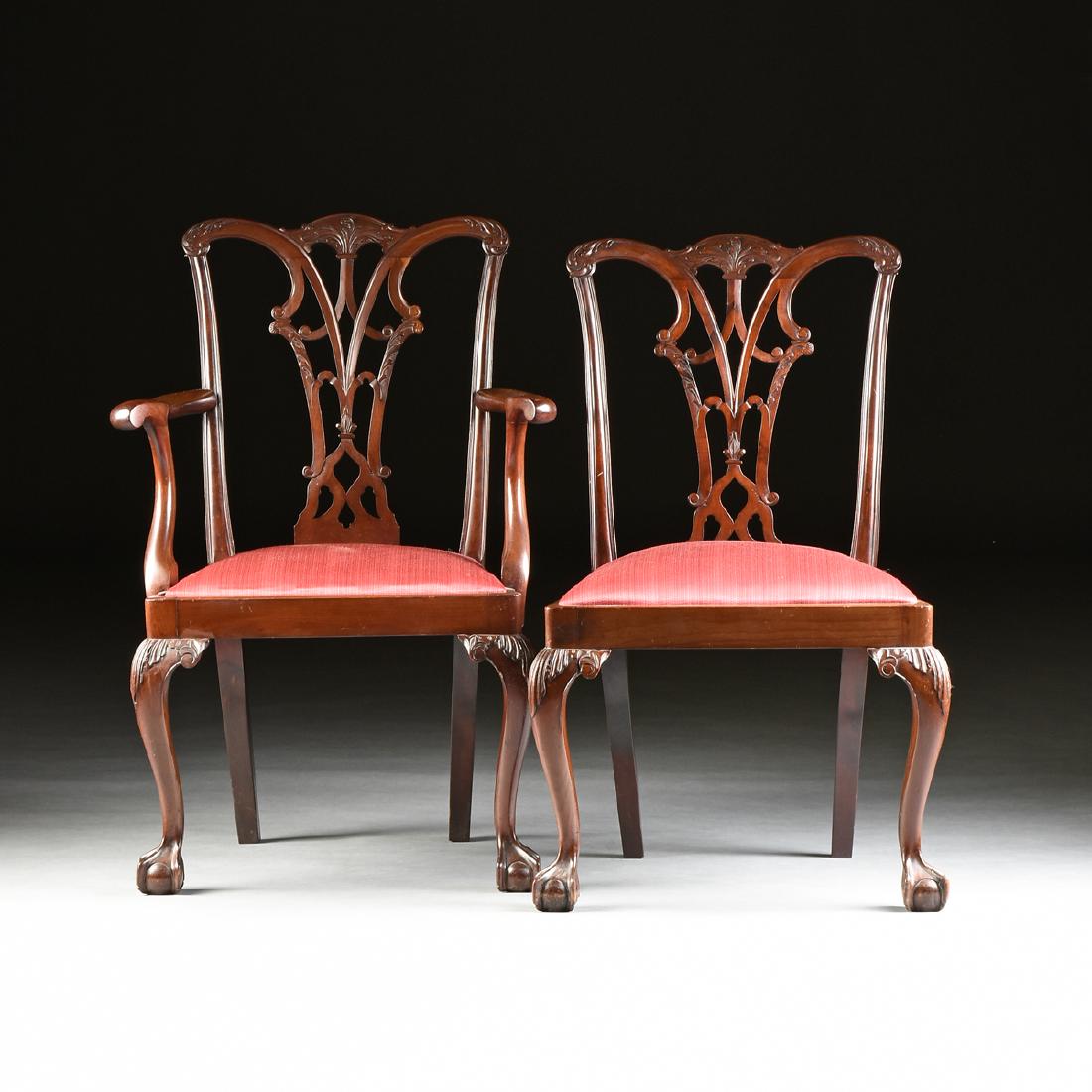 A SET OF EIGHT GEORGE III (1760-1811) STYLE MAHOGANY: A SET OF EIGHT GEORGE III (1760-1811) STYLE MAHOGANY DINING CHAIRS, AFTER THOMAS CHIPPENDALE (1718-1779), LATE 19TH/EARLY 20TH CENTURY, in the Gothic Revival taste, consisting of six side chairs and t