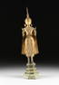 A RATTANAKOSIN (1782-1932) GILT BRONZE STANDING BUDDHA,