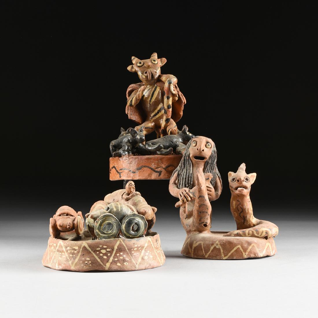 A GROUP OF THREE MEXICAN GLAZED TERRA COTTA FIGURAL (1 of 19)