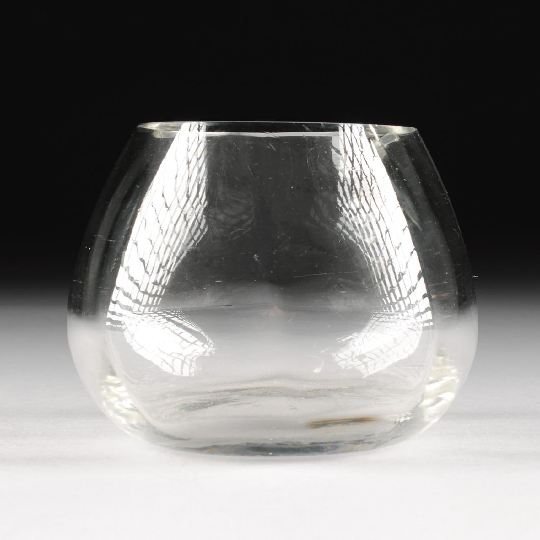 A SCANDINAVIAN OPTIC CLEAR GLASS VASE, 20TH CENTURY,: A SCANDINAVIAN OPTIC CLEAR GLASS VASE, 20TH CENTURY, of short bud form with a flat rim above internal vertical ribbed decoration. Height: 4 1/2" Diameter: 5" 1/2