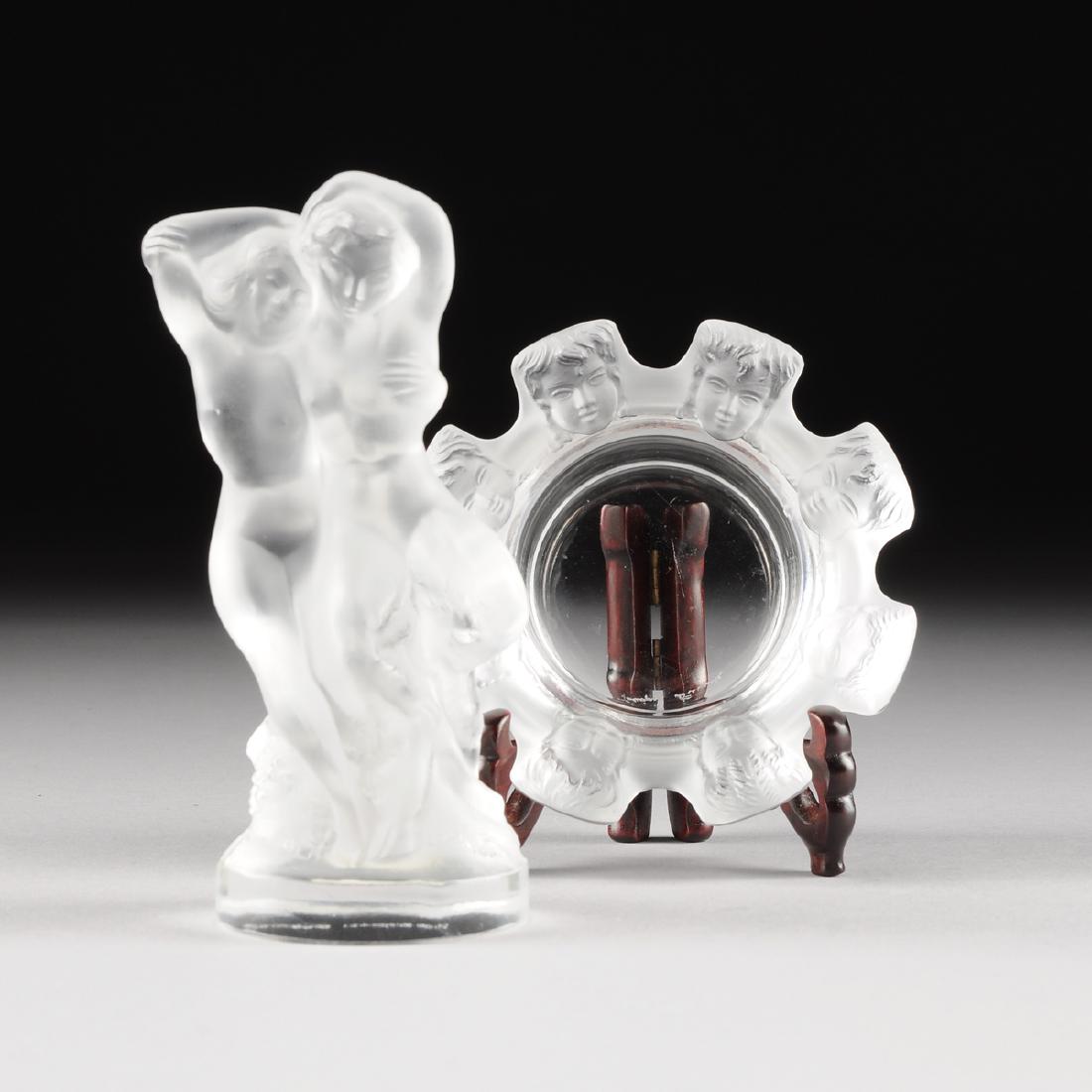 TWO LALIQUE FROSTED GLASS PIECES, SAINT NICHOLAS AND: TWO LALIQUE FROSTED GLASS PIECES, SAINT NICHOLAS AND FAUN PATTERNS, ENGRAVED SIGNATURES, MODERN, comprising a diminutive Saint Nicholas cendrier of tapering circular form and a rim of rectangular tabs