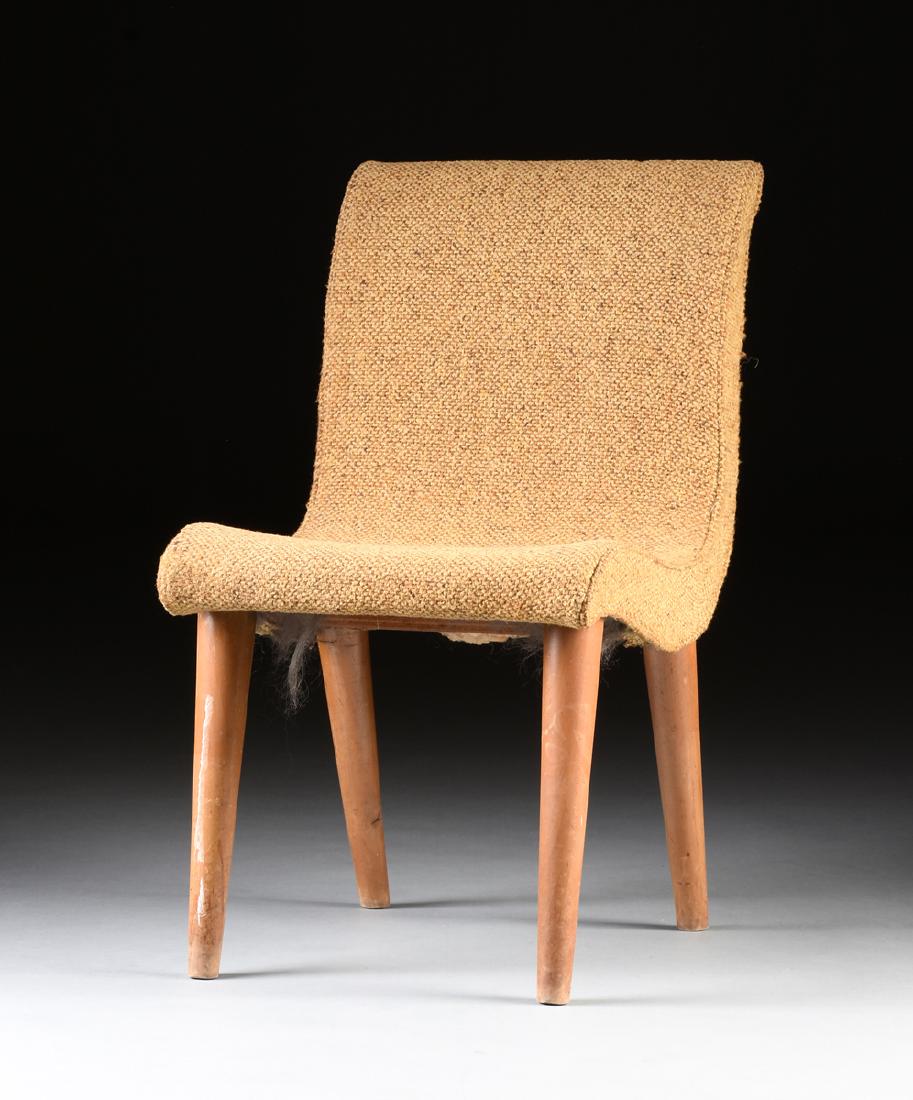 A RUSSEL WRIGHT (American 1904-1976) "MODERNMATES": A RUSSEL WRIGHT (American 1904-1976) "MODERNMATES" UPHOLSTERED DINING CHAIR, FOR CONANT-BALL, GARDNER, MASSACHUSETTS, CIRCA 1935-1949, the scoop form upholstered chair raised on tapering round maple l