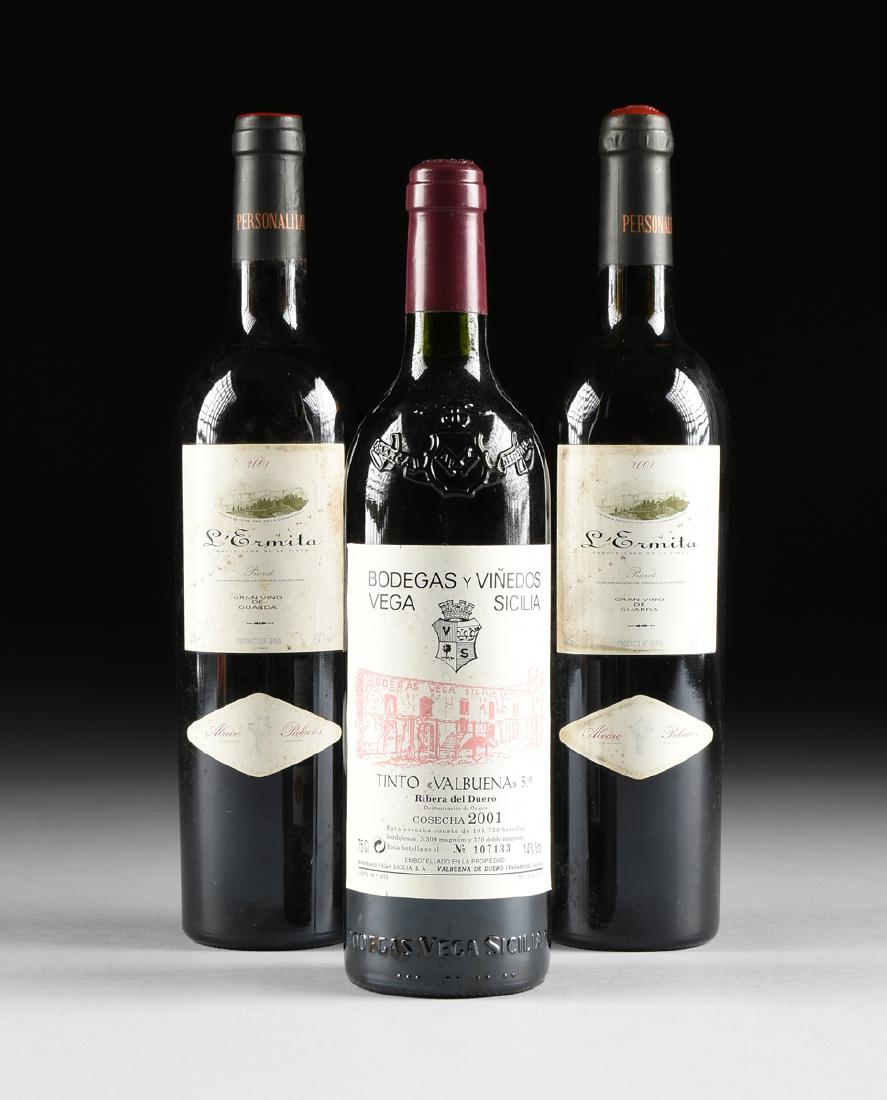 A GROUP OF THREE BOTTLES OF VINTAGE SPANISH WINE,: A GROUP OF THREE BOTTLES OF VINTAGE SPANISH WINE, comprising two bottles of 2001 Priorat Alvaro Palacios L'Ermita and one bottle of 2001 Ribera del Duero Vega Sicilia Valbuena 5 Ano Alvarez. All bottl