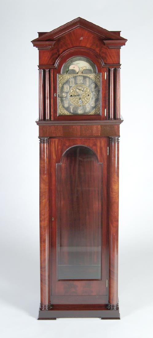 AN EARLY 20TH CENTURY EDWARDIAN FLAME MAHOGANY TALL (1 of 2)