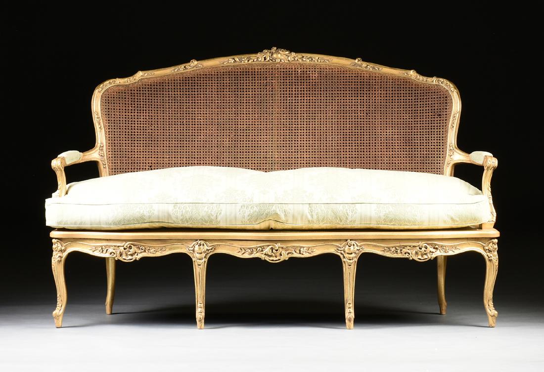 A LOUIS XV STYLE GILTWOOD CANE BACK SETTEE, FIRST HALF (1 of 8)