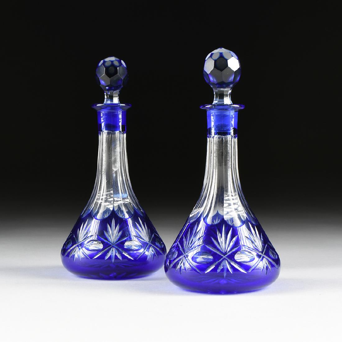 A PAIR OF BOHEMIAN CUT AND CASED CRYSTAL DECANTERS, (1 of 8)