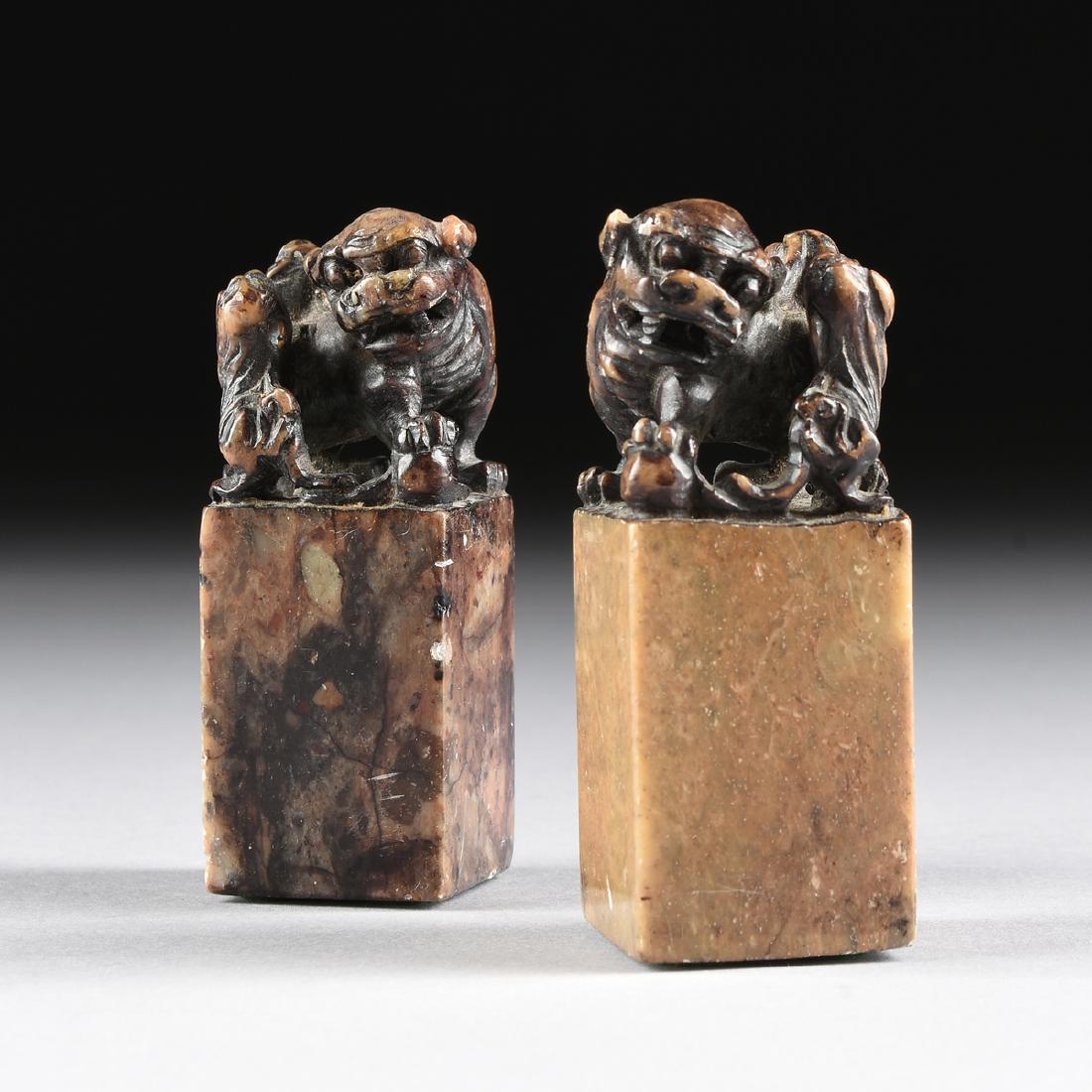 A PAIR OF CHINESE CARVED SOAPSTONE BUDDHISTIC LION (1 of 7)