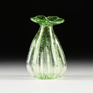 A VINTAGE ITALIAN MURANO STYLE APPLE GREEN BUBBLE GLASS: A VINTAGE ITALIAN MURANO STYLE APPLE GREEN BUBBLE GLASS VASE, MID/LATE 20TH CENTURY, the six petal rim, over a bag or sack form, lobed body. Diameter: 4.75" Height: 8.00"