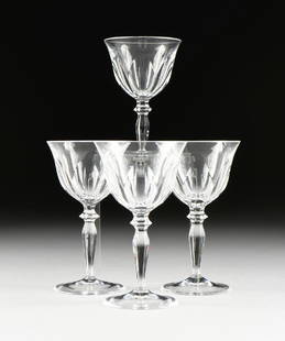 A SET OF FOUR PEILL & PUTZLER CUT CRYSTAL WINE GLASSES,: A SET OF FOUR PEILL & PUTZLER CUT CRYSTAL WINE GLASSES, RHEINLAND PATTERN, GERMAN, CIRCA 1960, each in the traditional Rheinland pattern and verso acid etched maker's mark, height: 6.25".