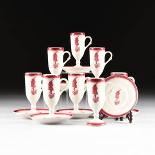 EIGHT STERLING CHINA COMPANY TRANSFER PRINTED VITRIFIED: EIGHT STERLING CHINA COMPANY TRANSFER PRINTED VITRIFIED CERAMIC "CAFE BRULOT" CUPS AND SAUCERS, WELLSVILLE, OHIO, 1981, eight footed demi-tasse cups and eight saucers, each with red transfer printed d