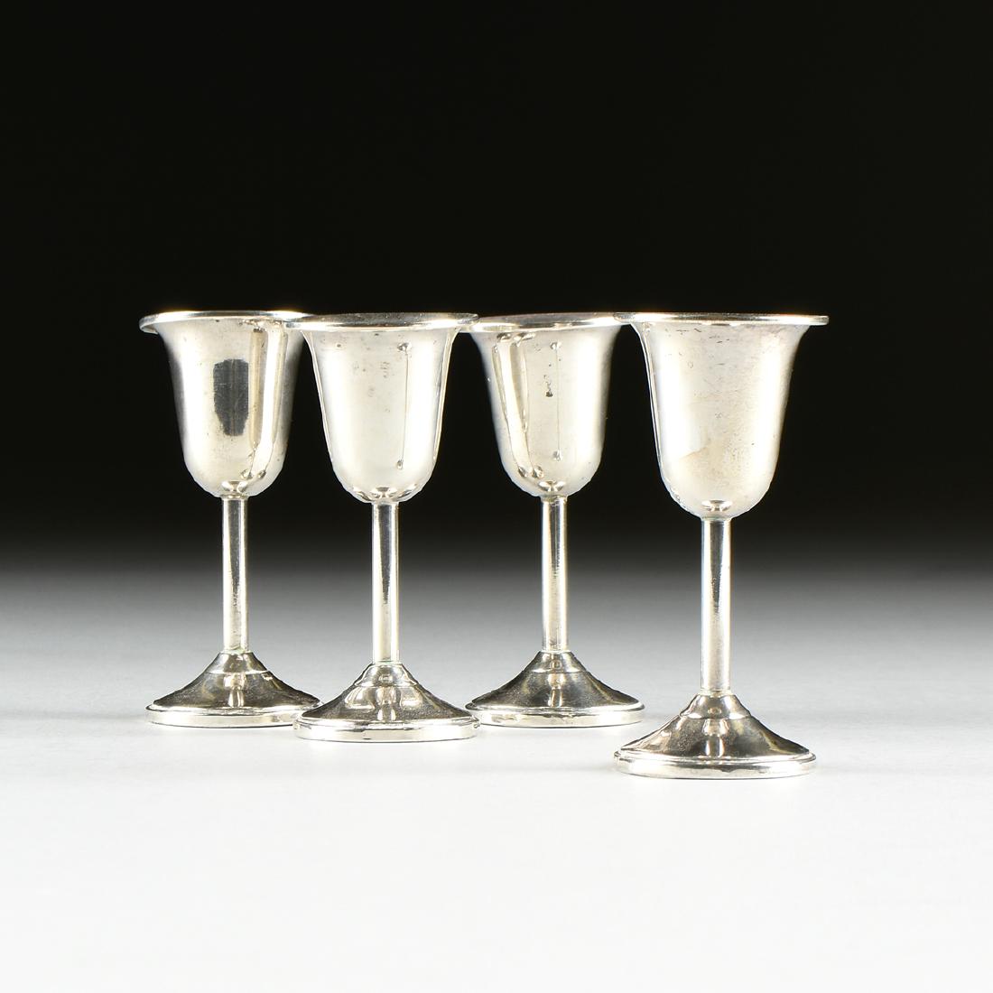 A SET OF FOUR M. FRED HIRSCH CO. WEIGHTED STERLING (1 of 3)