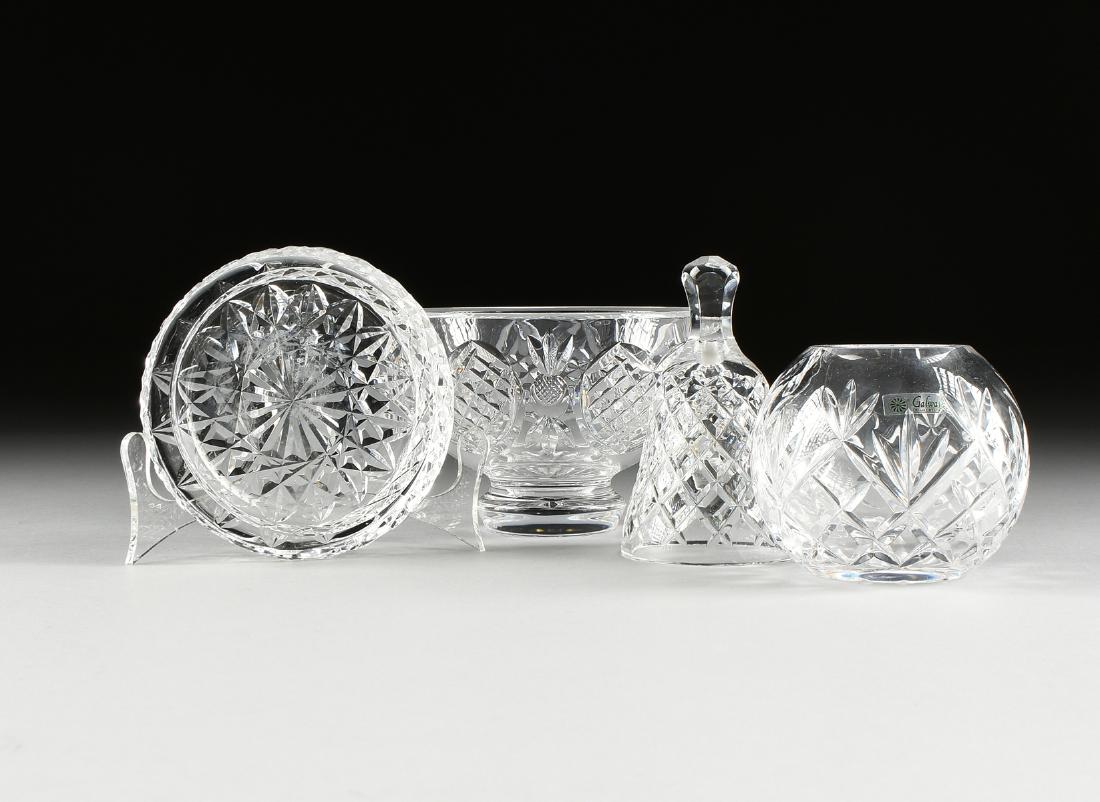 A GROUP OF FOUR PIECES OF TABLE CRYSTAL, IRISH, 20TH: A GROUP OF FOUR PIECES OF TABLE CRYSTAL, IRISH, 20TH CENTURY, a Tipperary a wine bottle coaster, diameter: 4.75"; a Waterford dinner bell, diameter: 3"; a Galway globe bud vase, diameter: 3.75"; and