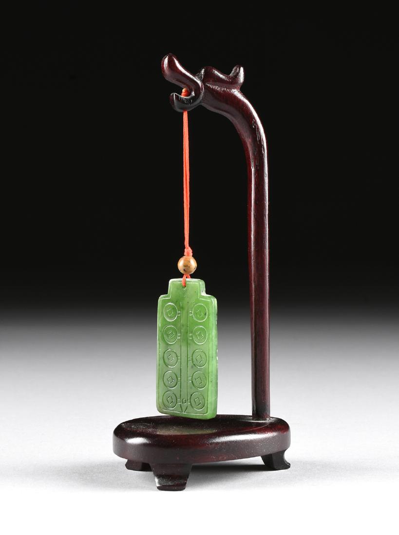 A CHINESE CARVED SPINACH GREEN JADE PENDANT, MODERN, (1 of 4)