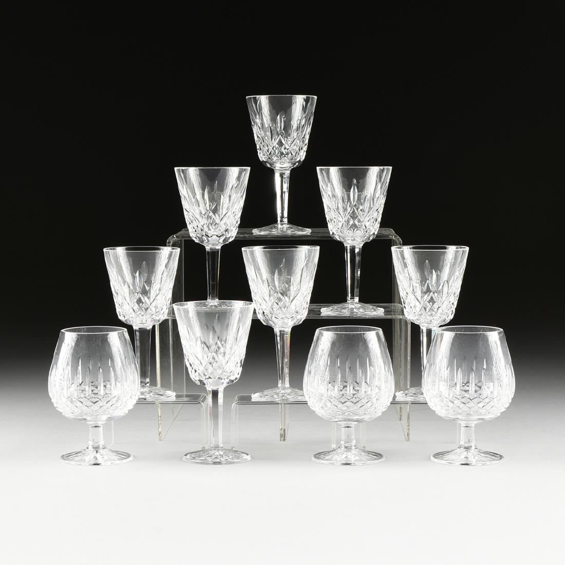 A GROUP OF TEN IRISH CLEAR CUT CRYSTAL STEMWARES, LATE: A GROUP OF TEN IRISH CLEAR CUT CRYSTAL STEMWARES, LATE 20TH CENTURY, comprising seven Waterford claret wine glasses in the "Lismore" pattern, the verso with manufacturer's acid etched mark, height: 5.