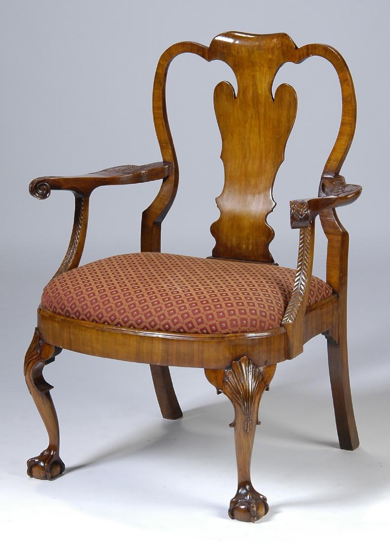 A GEORGE III STYLE CARVED WALNUT ARMCHAIR, (1 of 1)