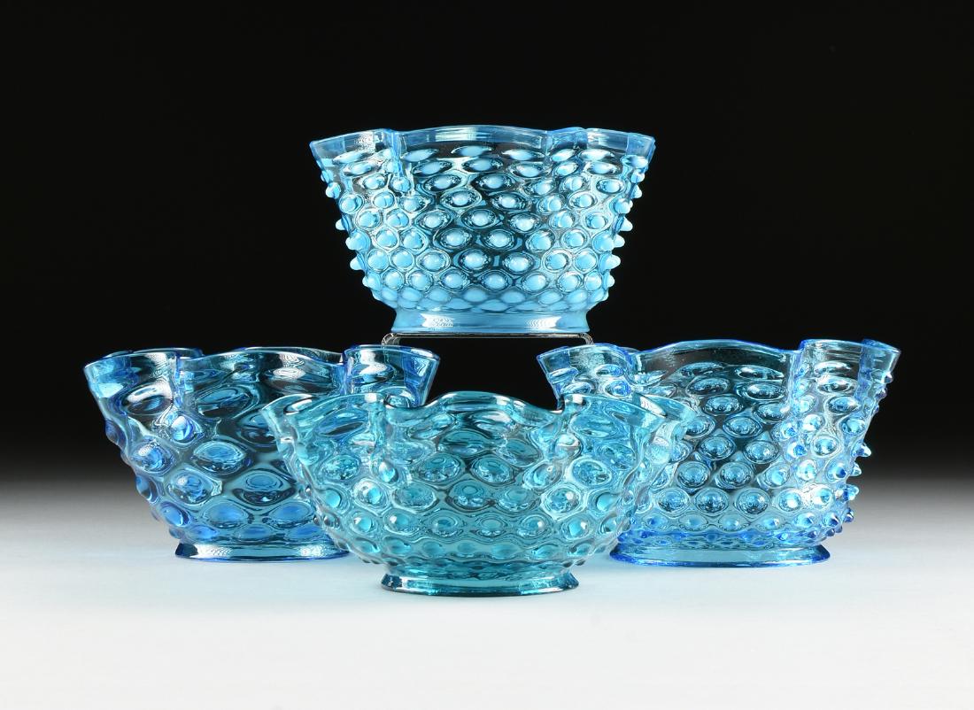 A GROUP OF FOUR LATE VICTORIAN BLUE HOBNAIL GLASS: A GROUP OF FOUR LATE VICTORIAN BLUE HOBNAIL GLASS PARLOR LIGHTING SHADES, LATE 19TH/EARLY 20TH CENTURY, varying in color intensity, and one with blue milky bosses, all with ruffled ends, height: 5", f