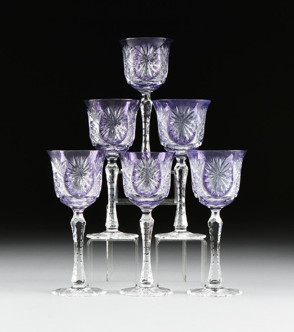 A SET OF SIX DOUBLE CASED AMETHYST CUT TO CLEAR WINE: A SET OF SIX DOUBLE CASED AMETHYST CUT TO CLEAR WINE HOCKS, ATTRIBUTED TO VAL ST. LAMBERT, SERIANG, BELGIUM, CIRCA 1930-1950, the bell form bowl cut with radiating rosettes between fields of diamonds 