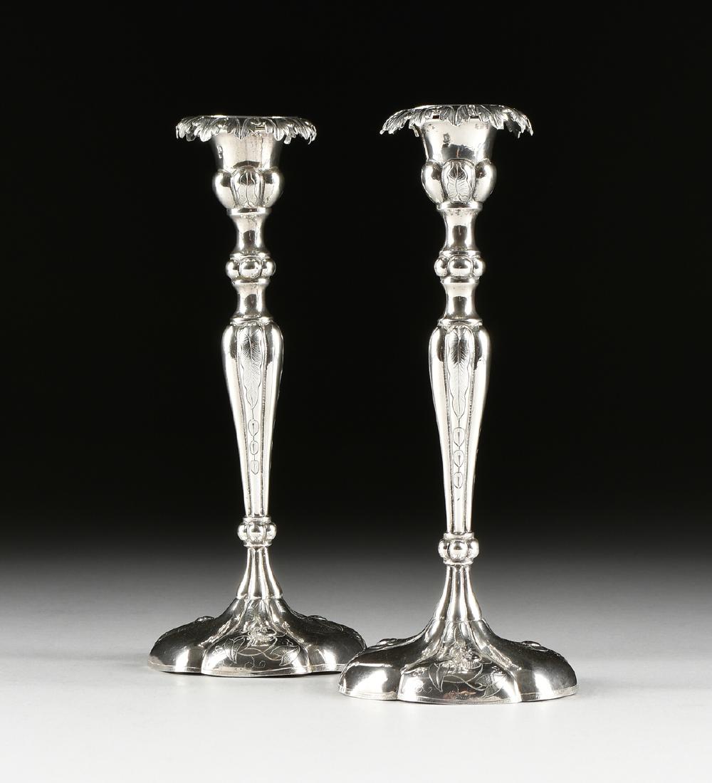 A PAIR OF EASTERN EUROPEAN SILVER CANDLESTICKS, (1 of 7)