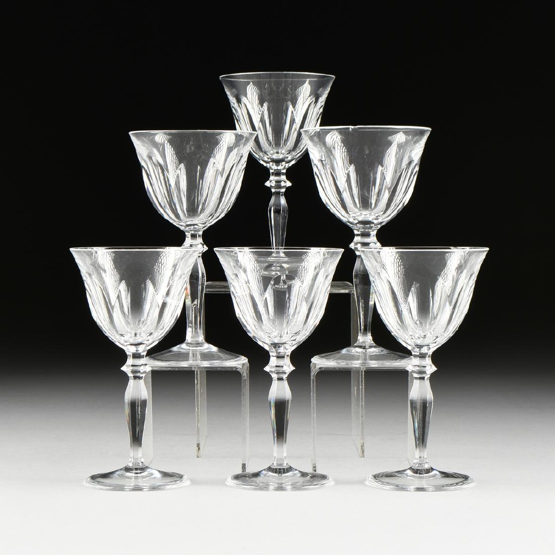 A SET OF SIX PEILL & PUTZLER CUT CRYSTAL WINE GLASSES,: A SET OF SIX PEILL & PUTZLER CUT CRYSTAL WINE GLASSES, RHEINLAND PATTERN, GERMAN, CIRCA 1960, each in the traditional Rheinland pattern, four verso acid etched maker's mark, height: 5.75".