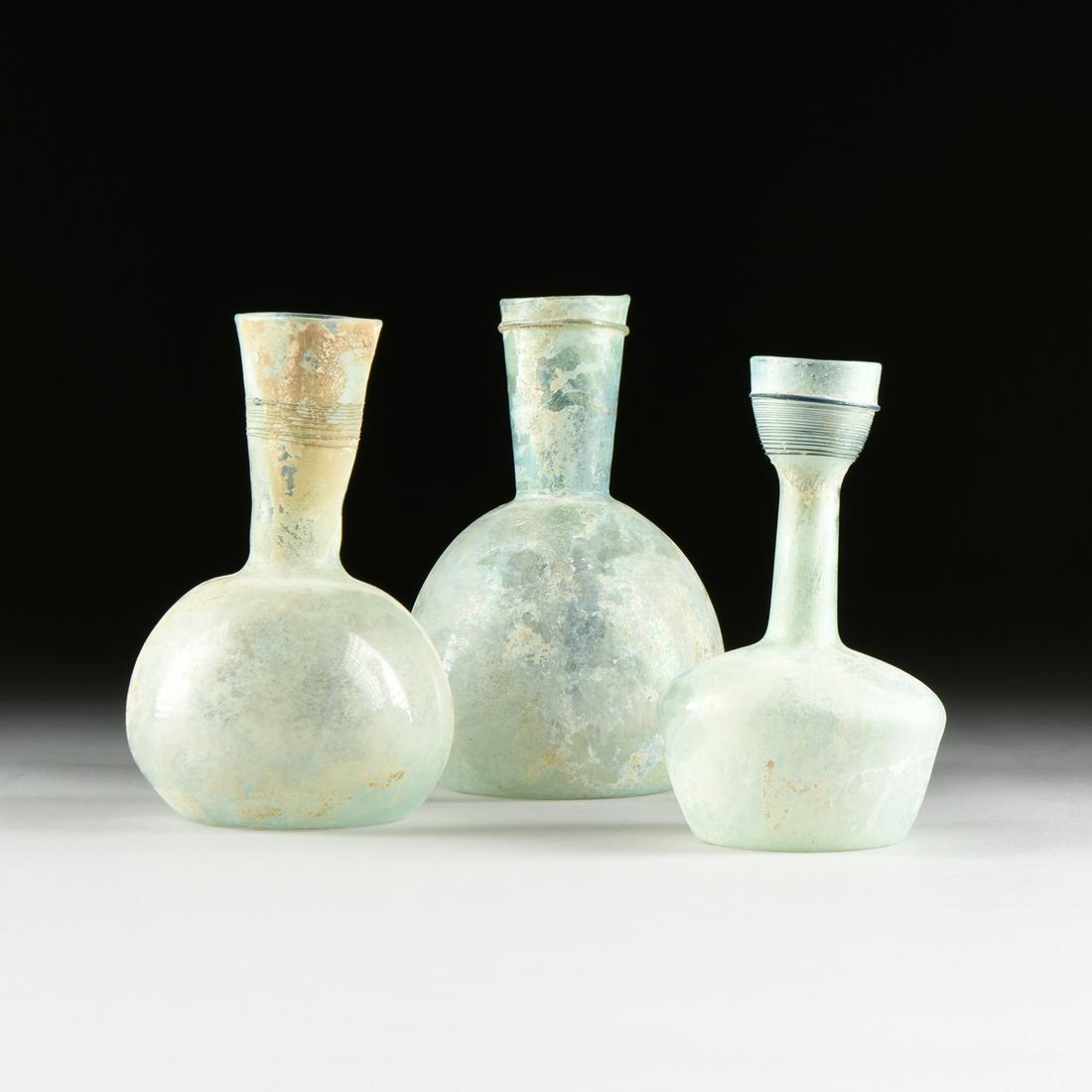 THREE ANCIENT ROMAN IRIDESCENT GREEN UNGUENTARIA, CIRCA (1 of 15)