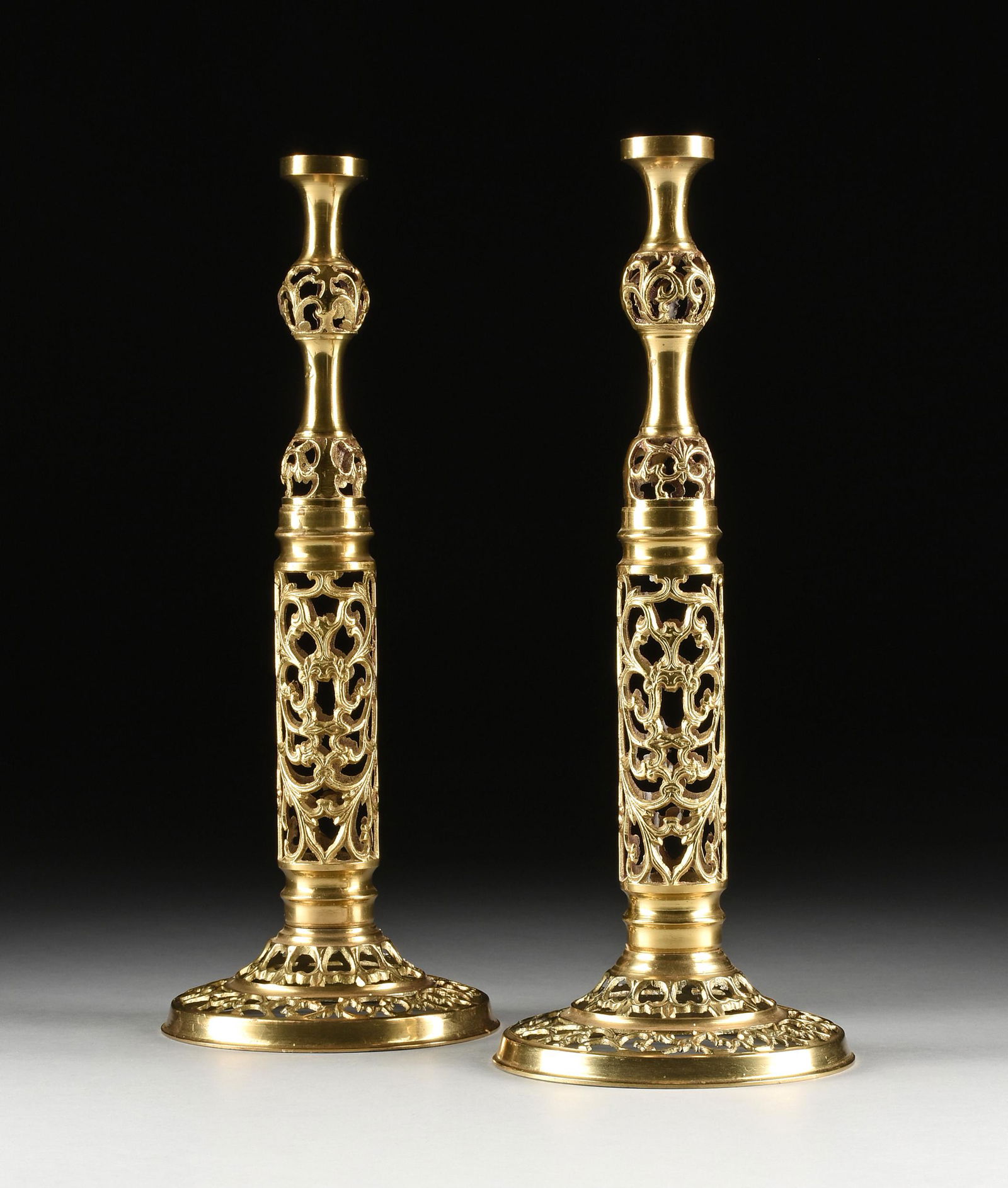 A PAIR OF INDIAN POLISHED AND RETICULATED BRASS (1 of 6)