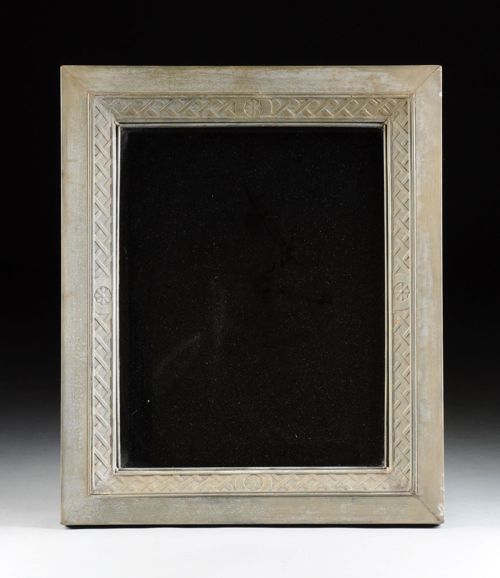 A MODERN PICKLED FINISH PRESSED METAL MIRROR, (1 of 3)