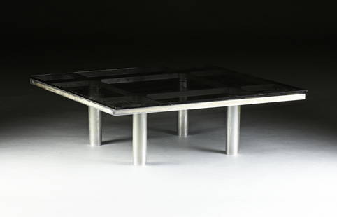 A VINTAGE MODERN BLACK GLASS AND CHROMED STEEL COFFEE: A VINTAGE MODERN BLACK GLASS AND CHROMED STEEL COFFEE TABLE, 1970s, the beveled edge square form glass top on a conforming chrome frame raised on cylindrical chrome legs. Height: 15" Width: 45 1/4" De