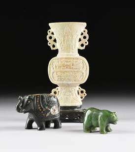 AN ASSEMBLED GROUP OF THREE HARDSTONE CARVINGS, MODERN,: AN ASSEMBLED GROUP OF THREE HARDSTONE CARVINGS, MODERN, 20TH CENTURY, comprising an Inuit spinach jade figure of a bear, length: 3"; an Indian mother-of-pearl, malachite, sienna and various other