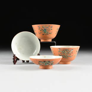 A PAIR OF FAMILLE ROSE ORANGE GROUND ENAMELED PORCELAIN: A PAIR OF FAMILLE ROSE ORANGE GROUND ENAMELED PORCELAIN COVERED RICE BOWLS, CHINESE REPUBLIC PERIOD (1912-1949), with auspicious symbols, each piece marked with a red rubber stamp Tongzhi(1862-1874)