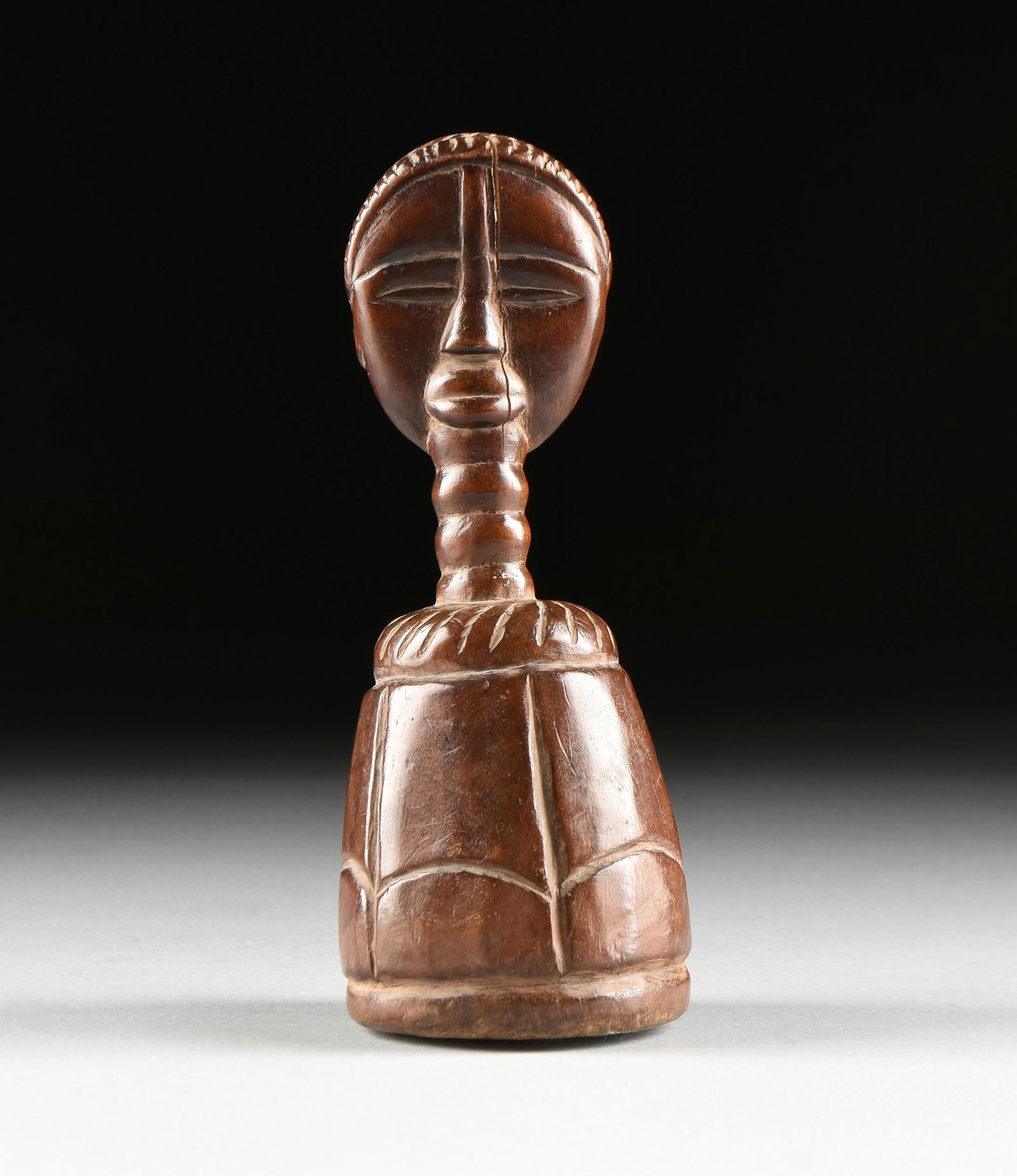 AN AFRICAN CARVED WOOD ALTARPIECE, ATTRIBUTED TO THE (1 of 8)