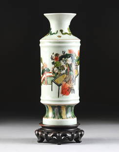 AN ANTIQUE CHINESE FAMILLE VERT PORCELAIN VASE, QING: AN ANTIQUE CHINESE FAMILLE VERT PORCELAIN VASE, QING DYNASTY, of cylindrical form with sides depicting a maiden and her young seated at an outdoor table with an attendant in the distance, with a waist