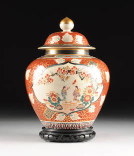 A LARGE JAPANESE SATSUMA PARCEL GILT AND POLYCHROME: A LARGE JAPANESE SATSUMA PARCEL GILT AND POLYCHROME PORCELAIN GINGER JAR AND COVER, LATE 20TH CENTURY, of traditional domed lid form with two views of maidens conversing within gated gardens of