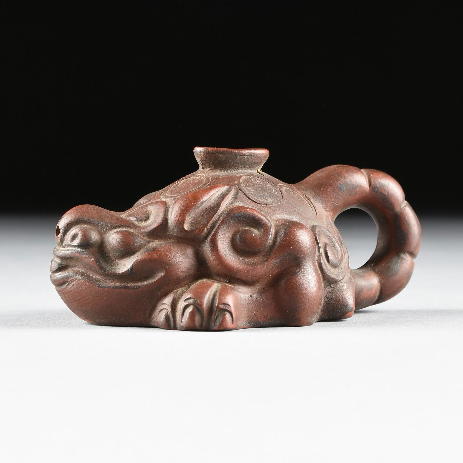 A CHINESE GLAZED STONEWARE POURING VESSEL IN THE FORM (1 of 8)