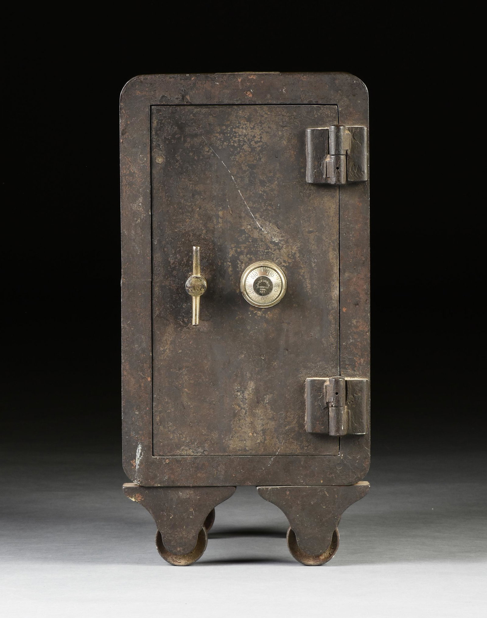 A CAST IRON SAFE ON WHEELS, AMERICAN, CIRCA 1900, (1 of 4)
