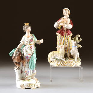 TWO DRESDEN PORCELAIN POLYCHROME PAINTED MAIDEN FIGURAL: TWO DRESDEN PORCELAIN POLYCHROME PAINTED MAIDEN FIGURAL GROUPS, BLUE CROSSED SWORDS MARK, ONE IMPRESSED 2011, 20TH CENTURY, one modeled as a maiden playing a flute surrounded by seated lamb and an att