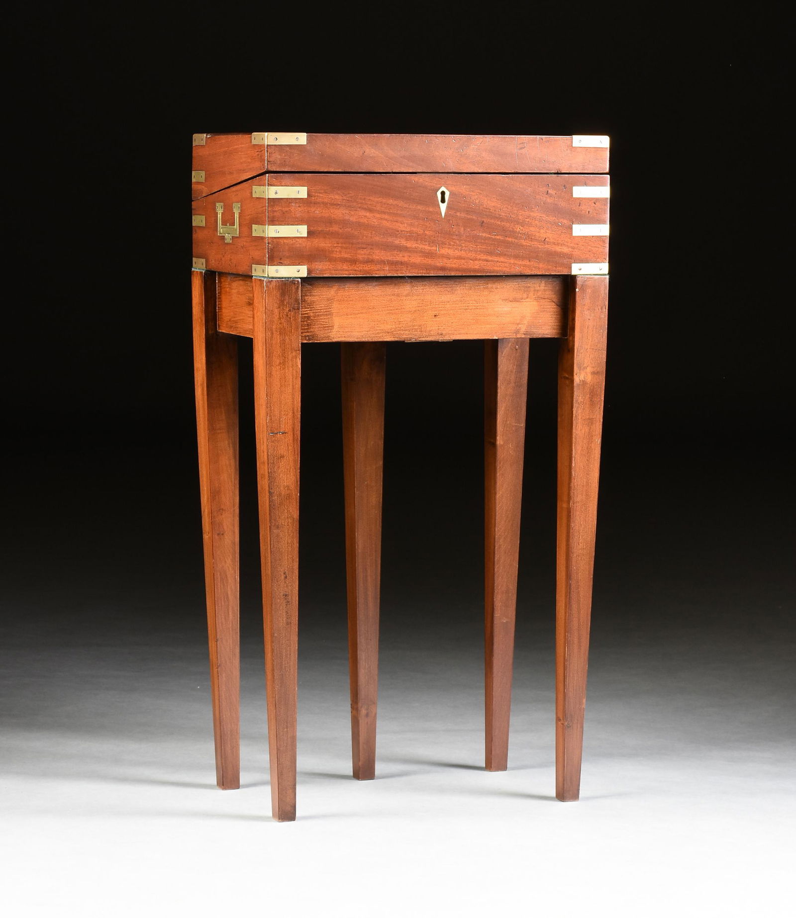 A LATE REGENCY BRASS MOUNTED CUBAN MAHOGANY CAMPAIGN (1 of 3)