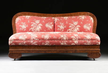 AN AMERICAN EMPIRE BURL WALNUT SOFA, CIRCA 1830,: AN AMERICAN EMPIRE BURL WALNUT SOFA, CIRCA 1830, in the New York fashion, the flat, serpentine, upholstered back, over a slightly bowed upholstered bench seat, raised on a wide skirt with egg-and-dart