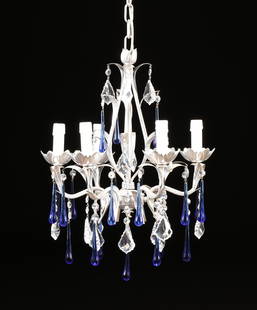 A CONTINENTAL SILVER PAINTED METAL AND CRYSTAL: A CONTINENTAL SILVER PAINTED METAL AND CRYSTAL SIX-LIGHT CHANDELIER, LATE 20TH CENTURY, with open cage form standard issuing foliate scrolled arms, and foliate pans, hung with cobalt blue raindrop