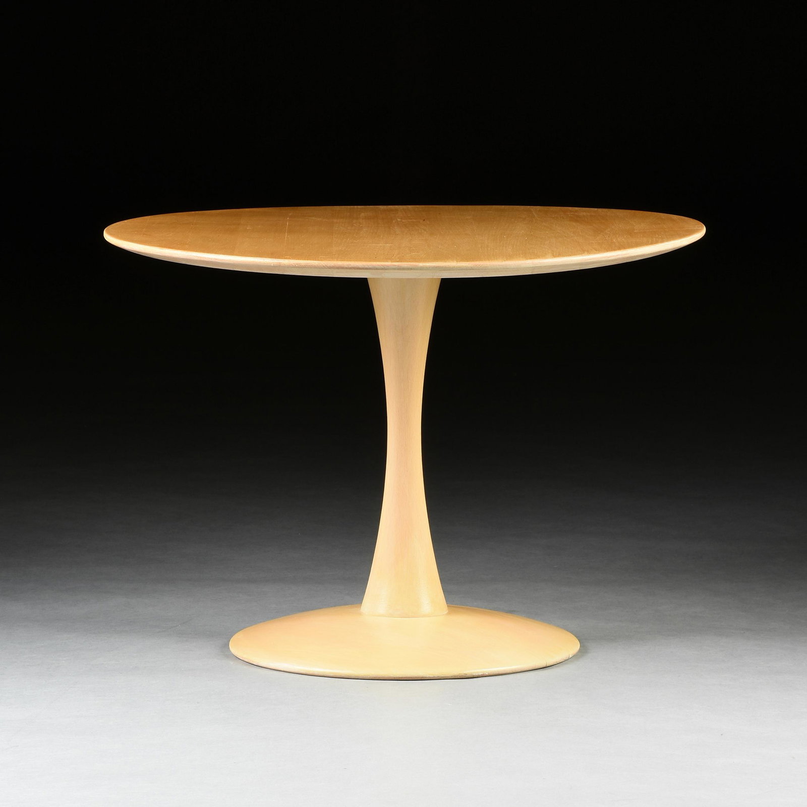 NINA DITZEL (Danish 1923-2005) A BIRCH SIDE TABLE,: NINA DITZEL (Danish 1923-2005) A BIRCH SIDE TABLE, "Toadstool," 1960s, the circular top on a flaring stem and conforming domed base, unmarked. Height: 19" Diameter: 26 3/4" Note: Nana Ditzel was a wor