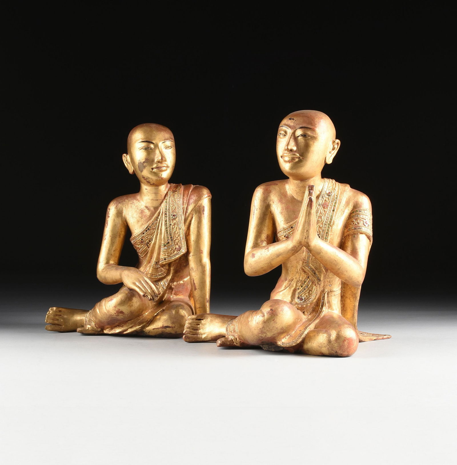 A PAIR OF THAI PARCEL GILT AND CARVED WOOD BUDDHIST (1 of 18)