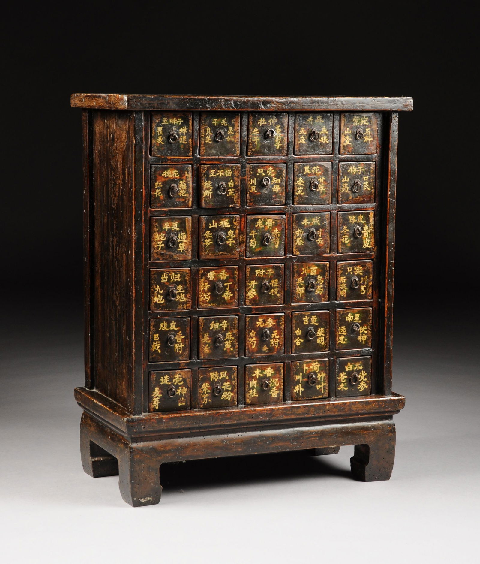 A CHINESE LACQUERED AND PAINTED WOOD APOTHECARY (1 of 5)