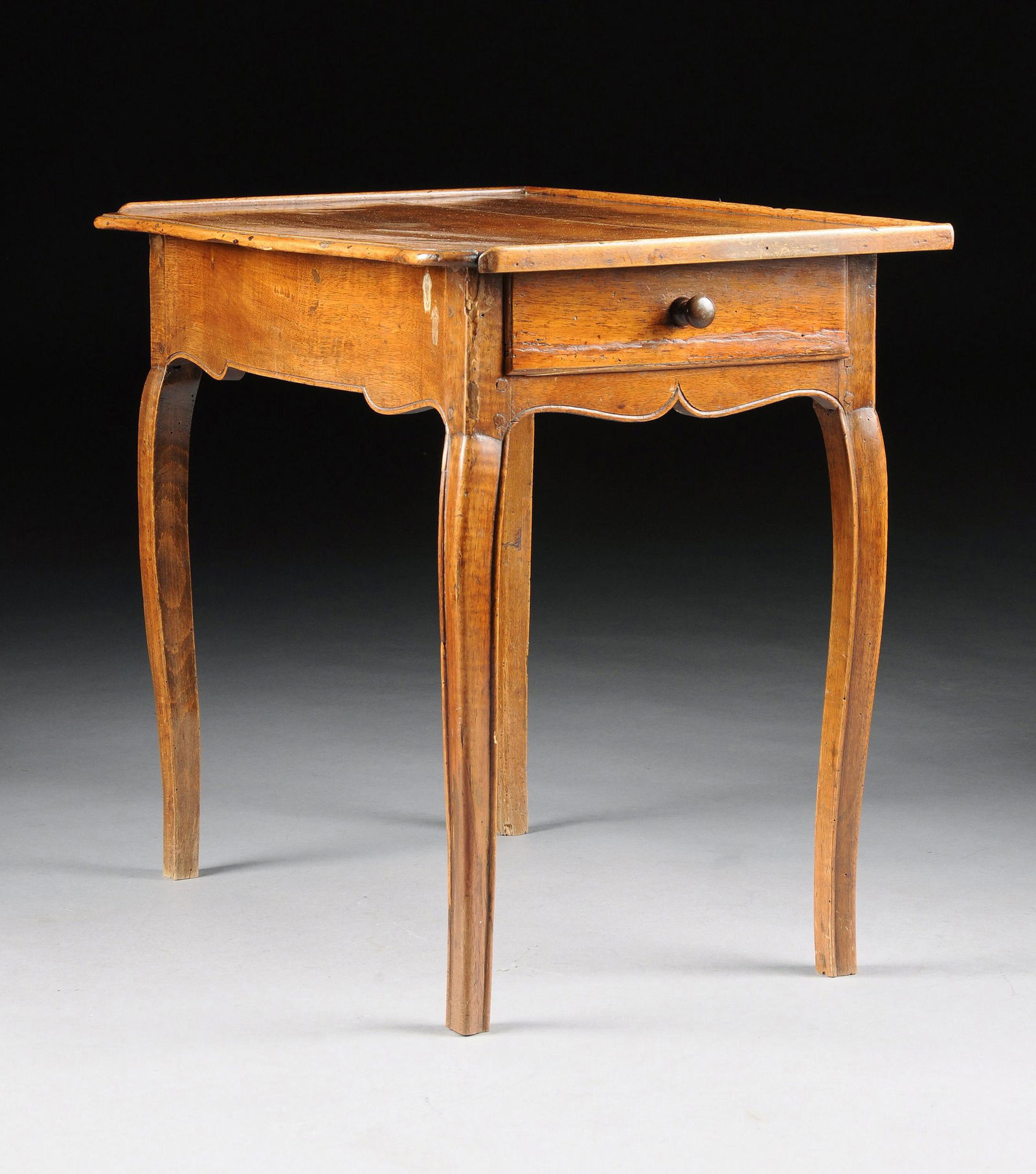 A FRENCH PROVINCIAL CARVED FRUITWOOD TABLE À ÉCRIRE, (1 of 1)