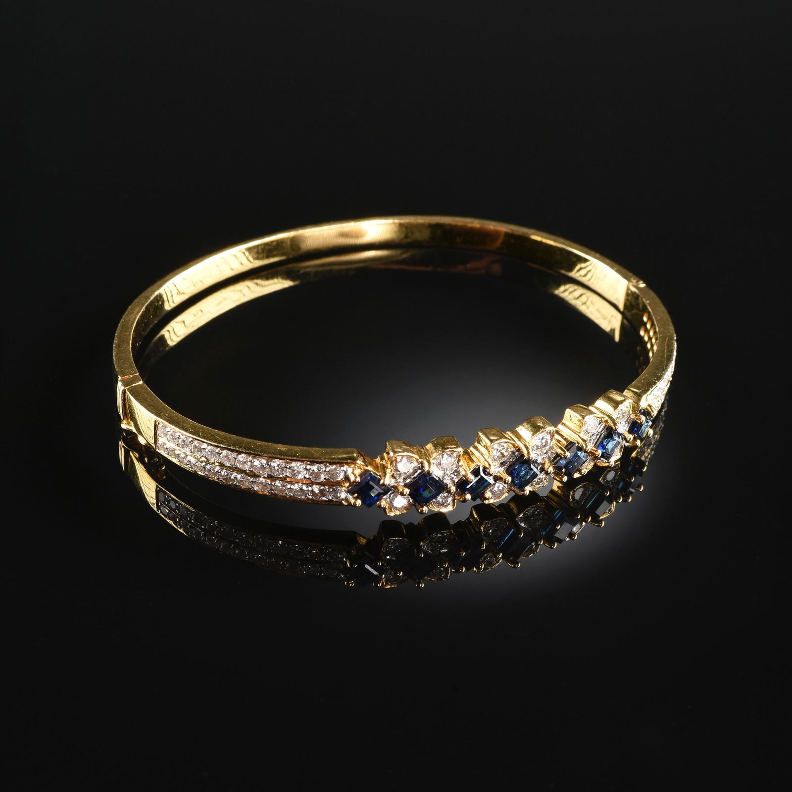 AN 18K YELLOW GOLD, SAPPHIRE, AND DIAMOND LADY (1 of 1)