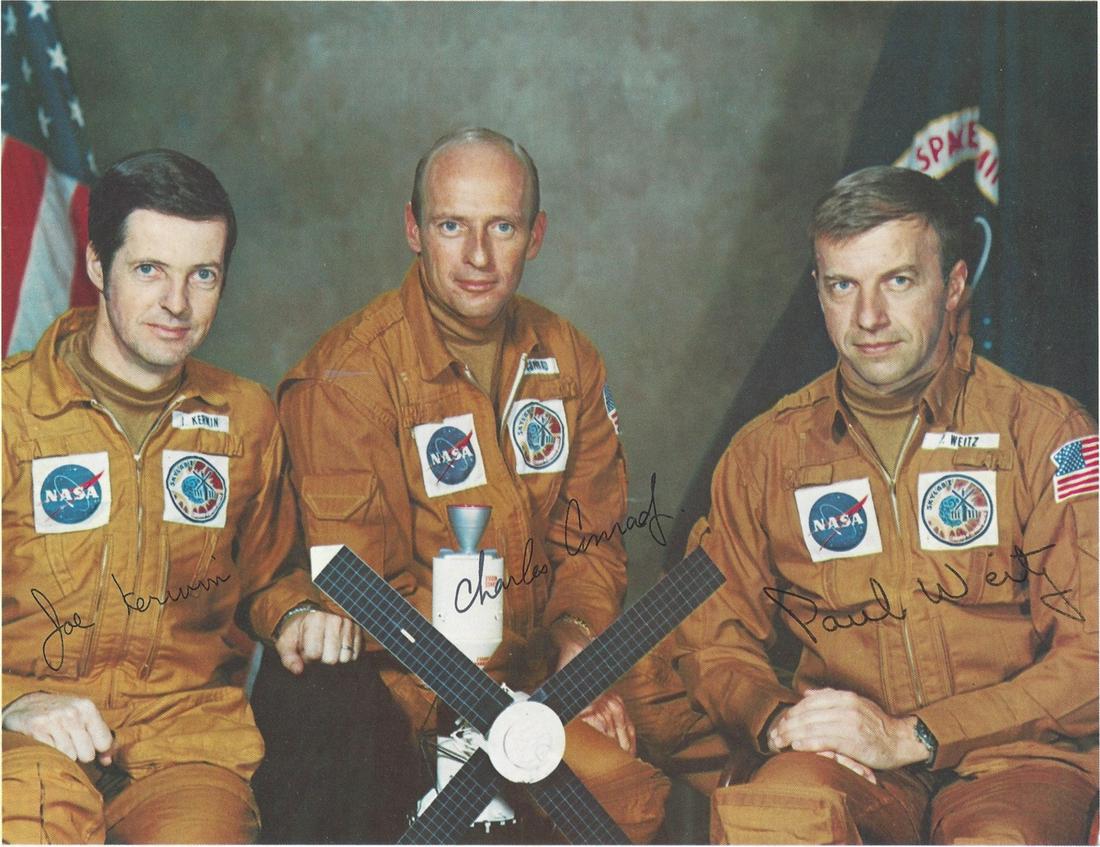 A GROUP OF THREE NASA ASTRONAUT PRINTS AND A PATCH, (1 of 4)