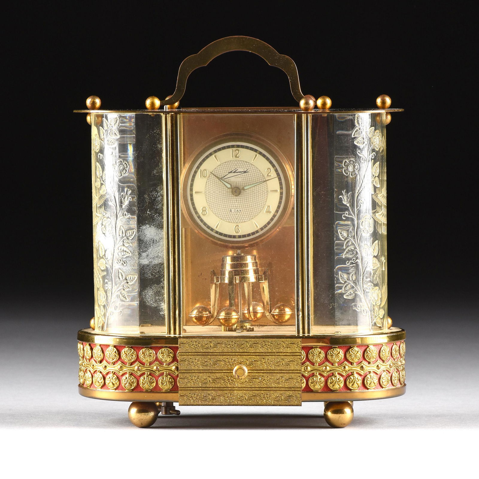 A JAPANESE GILT METAL, LUCITE, AND ENAMEL EIGHT DAY (1 of 8)