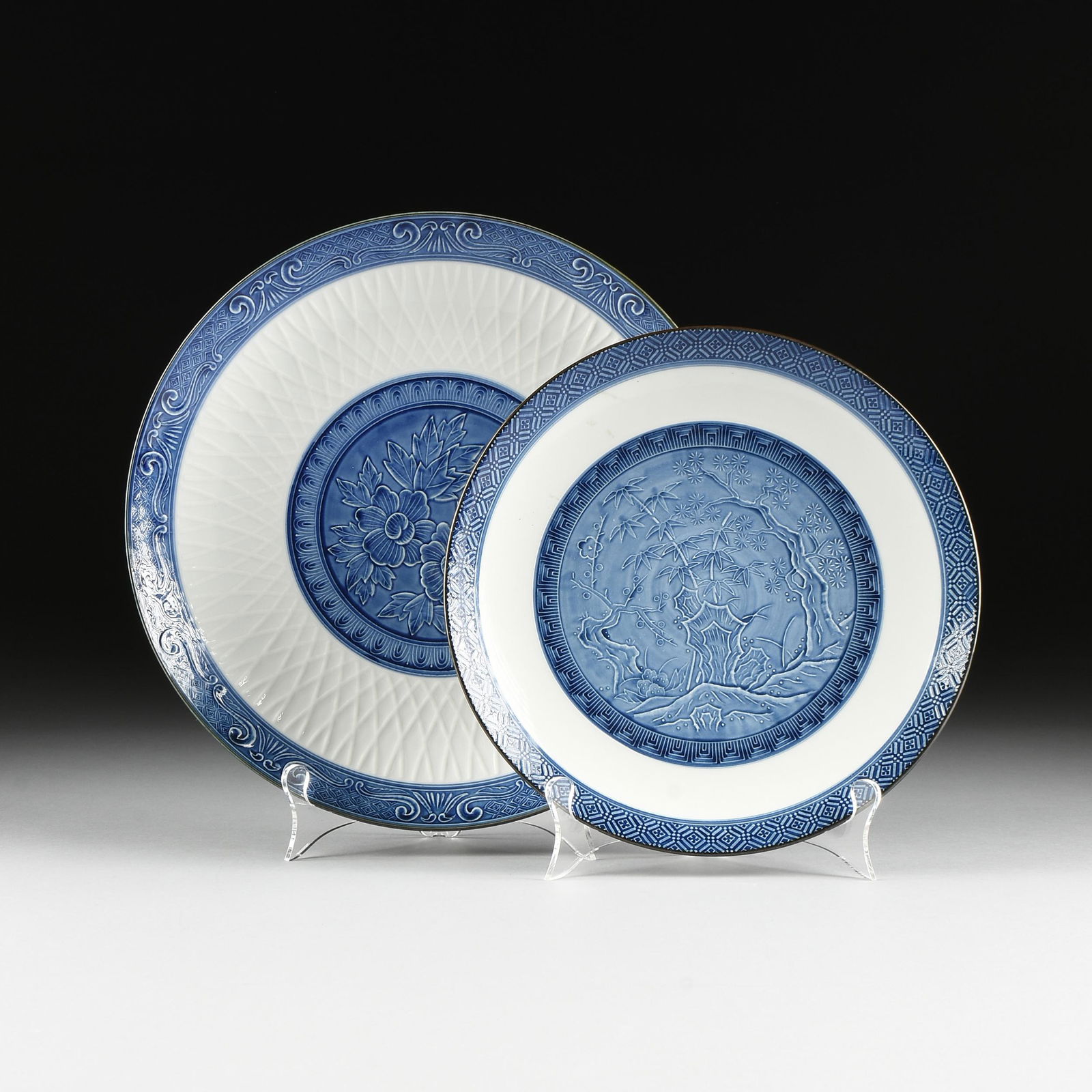 A GROUP OF TWO ARITA BLUE AND WHITE RELIEF PLATES, (1 of 11)