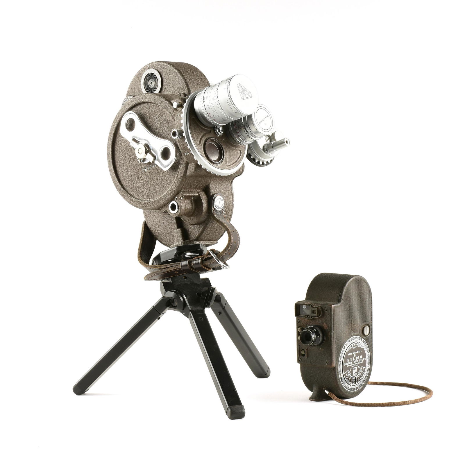 A GROUP OF TWO AMERICAN BELL AND HOWELL MOTION PICTURE: A GROUP OF TWO AMERICAN BELL AND HOWELL MOTION PICTURE CINE CAMERAS, CHICAGO, 1935-1960s, comprising a Bell and Howell 70DR camera, fitted with a P. Angenieux, Paris lens, 1960s, on a tripod, height: