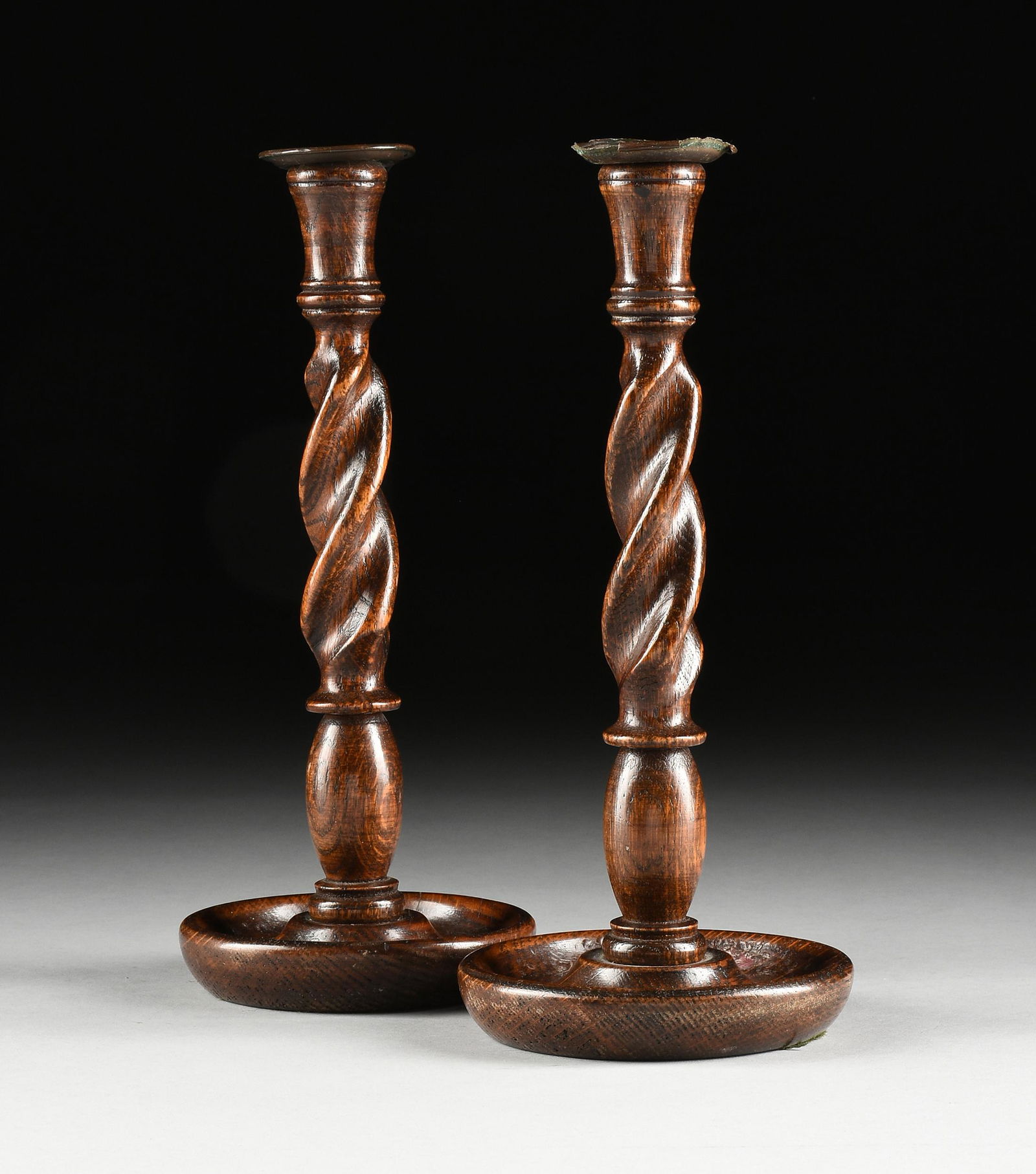 A PAIR OF CHARLES II STYLE OAK AND COPPER CANDLESTICKS, (1 of 6)